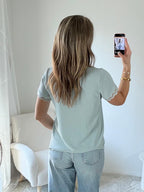 Blouse bleu vert détail dentelle