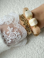 Bracelet doré à fleurs