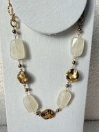 Collier perles nude doré