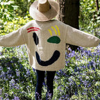 Clara | Pull Oversize Design Smiley Éclatant