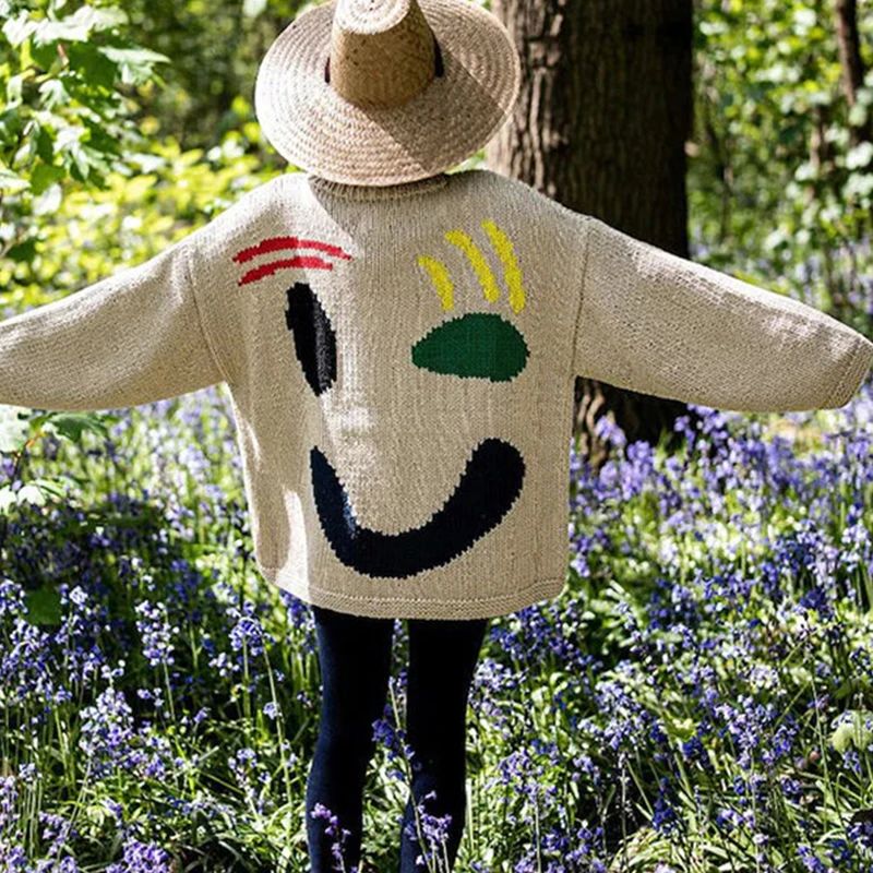 Clara | Pull Oversize Design Smiley Éclatant