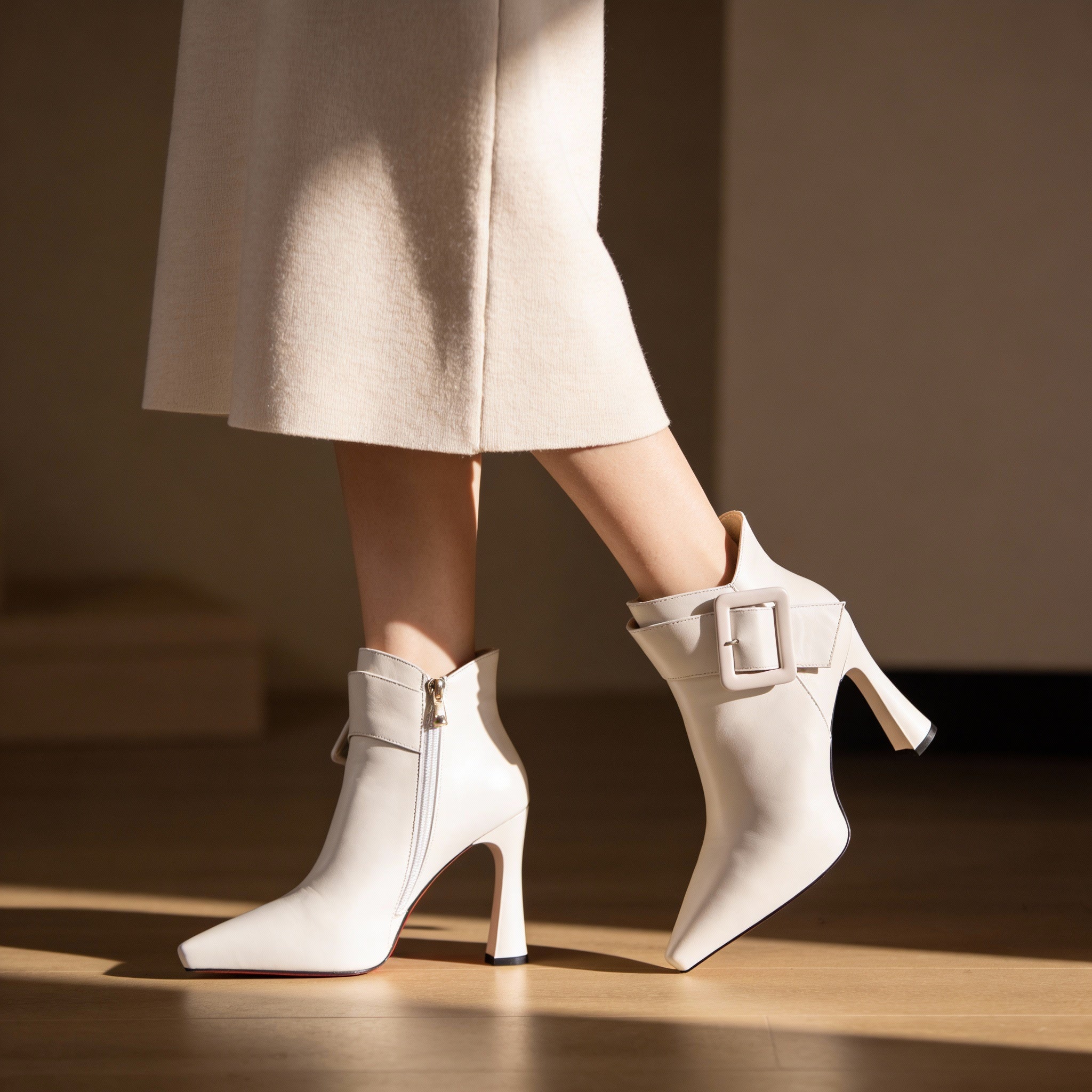Claudine | Bottines à talons et boucle oversize