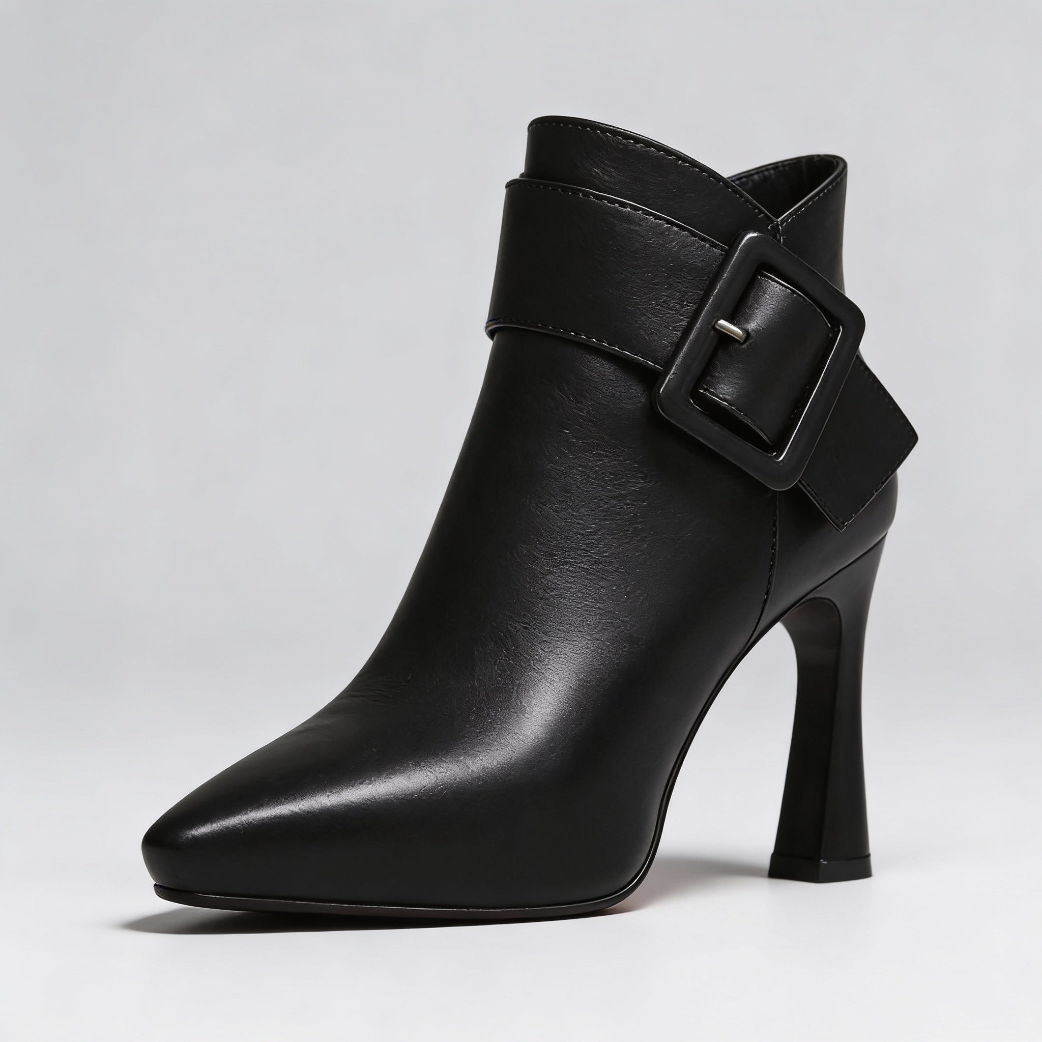 Claudine | Bottines à talons et boucle oversize